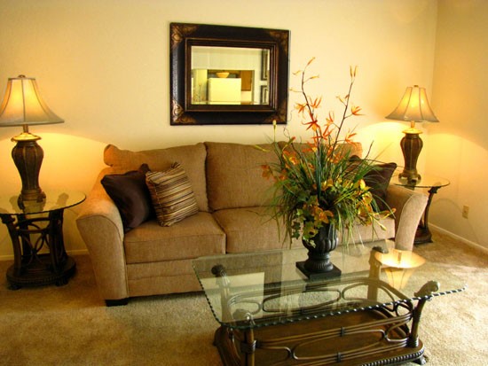 Pier Landing Apartments interior of model living with beautiful decorations and lots of sunlight