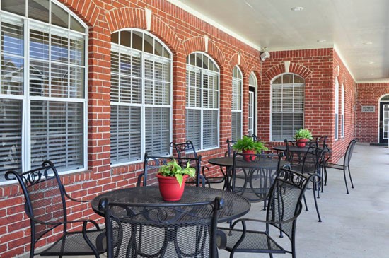 Champion Lake Outside Seating Area Right Outside Clubhouse Next to Pool