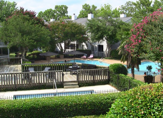 Pier Landing far away above view of the two pools next to each other and lots of trees
