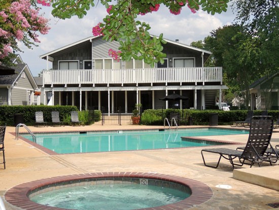 Pier Landing Apartments small spa/hot tub next to big pool, backside of clubhouse