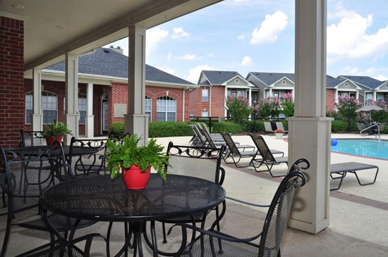 Champion Lake Apartments View to Pool From Under Patio/Deck from Clubhouse