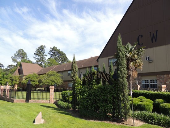 Castlewood Backside View Building, with Fence surrounding.