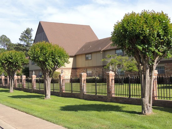 Castlewood Backside View of Apartment Building Plus the Fence
