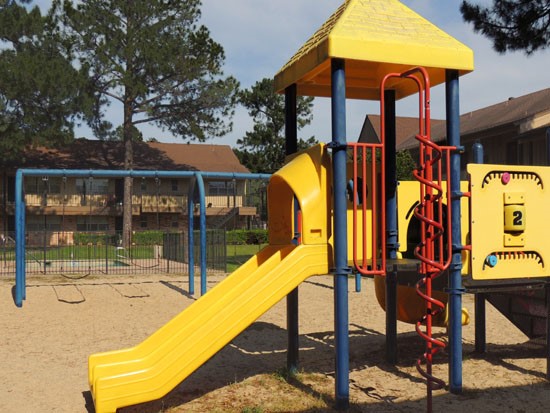 Castlewood Apartments Side View Of Big Colorful  Playground