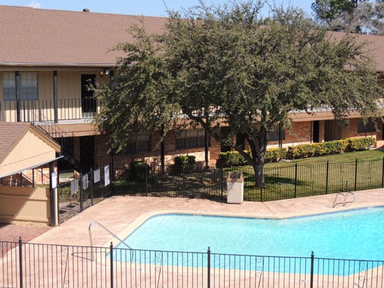 Castlewood Apartments Beautiful Overlook of Pool with Overhead Patio