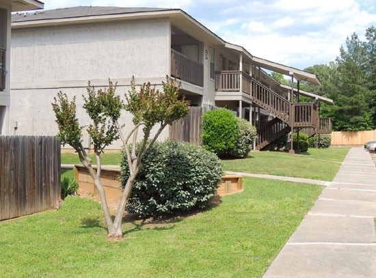 Cedar Creek Apartments Sidewalk view Leading to Apartment Buildings