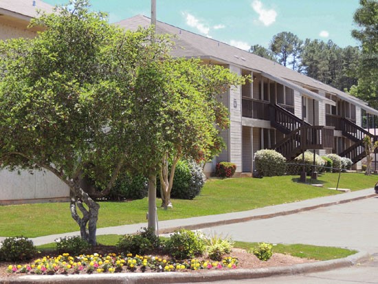 Cedar Creek Apartments Front Side View Of Beautiful Grey Apartment Buildings