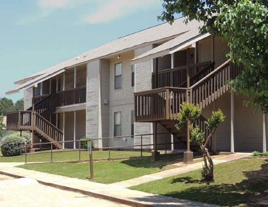 Cedar Creek Beautiful Mahogany and White Buildings with Fresh Green Grass