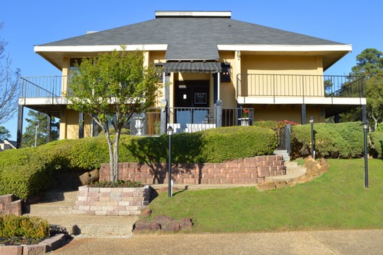 Chimney Hill Big Two Story Yellow Clubhouse with Stairs and a Ramp Leading to  Front Entrance