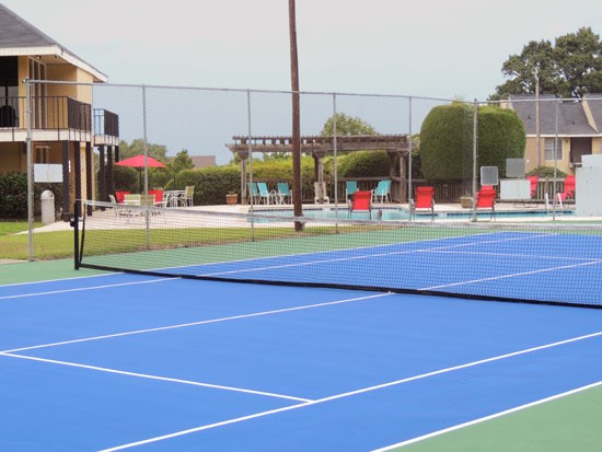 Chimney Hill Tennis Court Next to Pool Area Equipped with Next and Fence