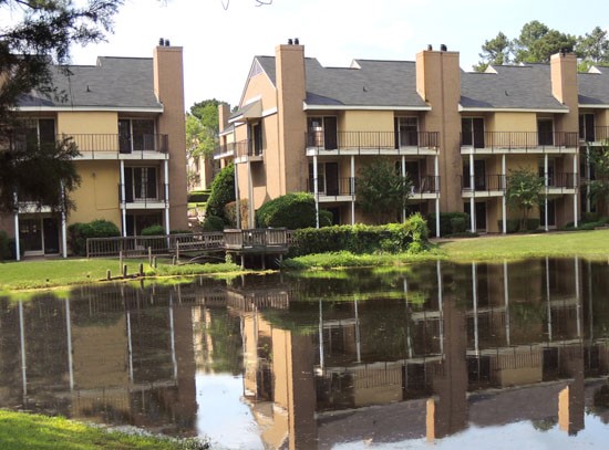 Chimney Hill Farside View of Big Pond In Middle Of Apartments in Shreveport