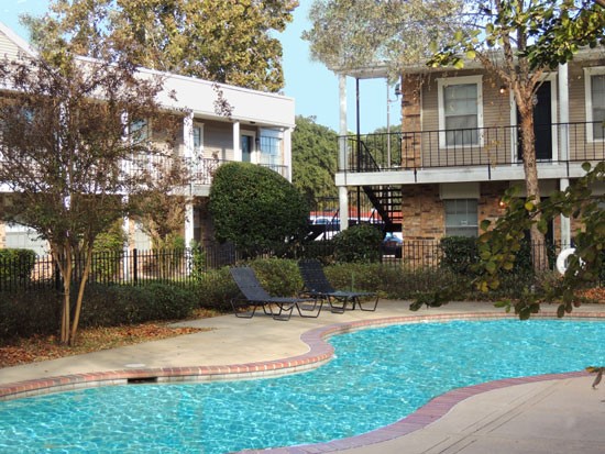 Cornerstone full look at pool area backside of clubhouse