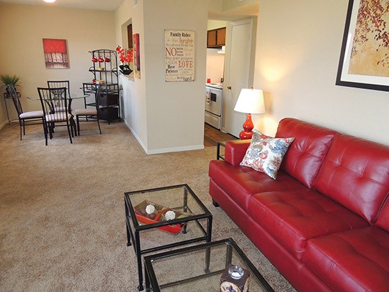Cornerstone Apartments huge open model living room with matching decorations