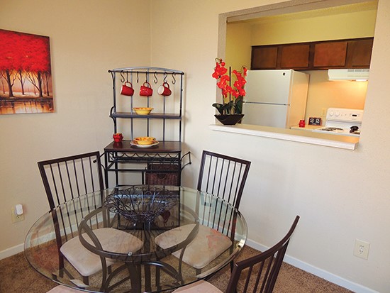 Cornerstone big model dining room looking into kitchen from bar area