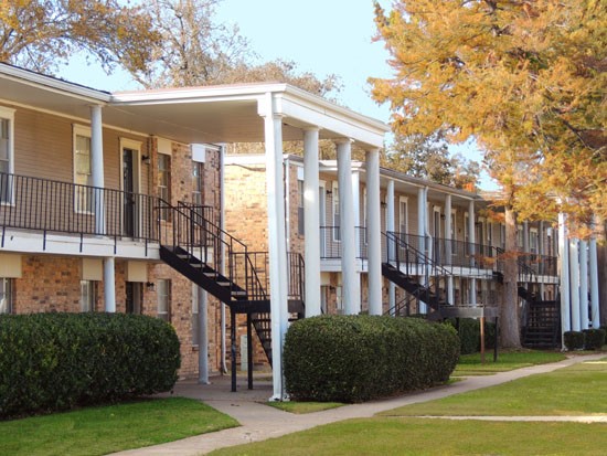 Cornerstone Apartments front side of motel style apartment buildings