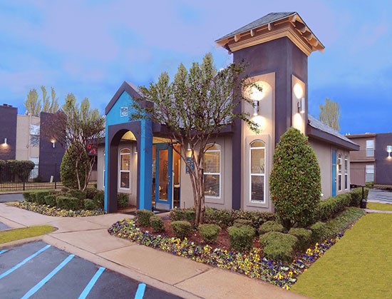 The Drake  Apartments stunning front office building at night in Bossier