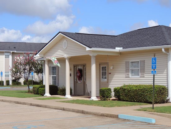 Fox Creek colonial front office building with own parking lot
