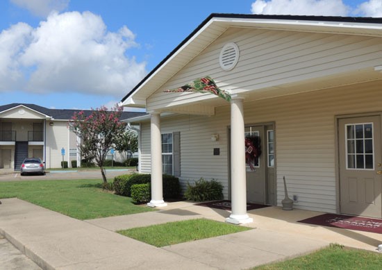 Fox Creek closer look at front office building with multiple entrances