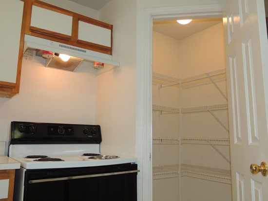 Fox Creek Model pantry with storage space on both sides of the wall