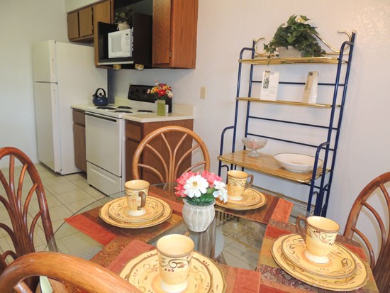 Kingston Village model dining room looking into open kitchen