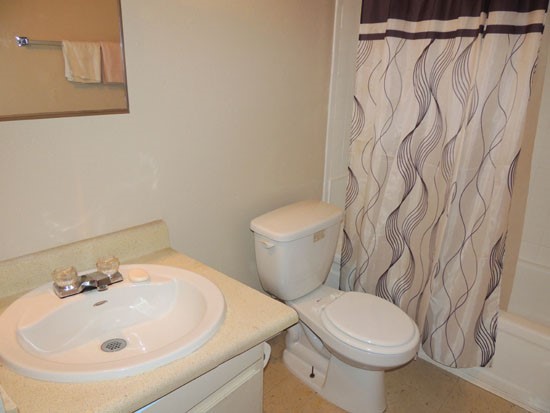 La Tierra white model bathroom inside apartments