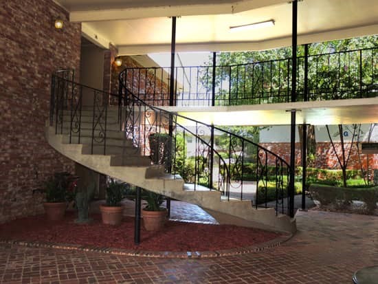 Park Villa Apartments Stunning staircase leading up to second floor of apartment buildings