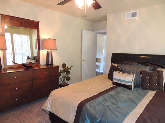 Riverbend second model bedroom with large dresser/vanity