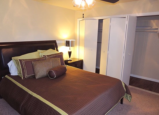 Riverbend Apartments beautiful model bedroom with large closet space