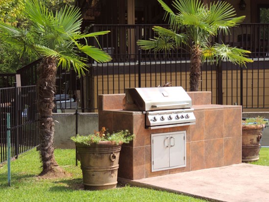 Riverbend big grill area next to gated pool