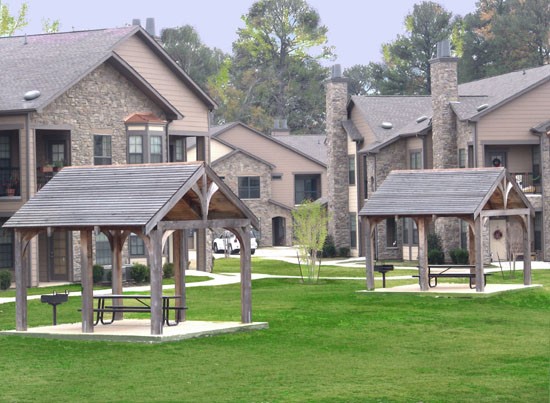 Springridge outside gazebos with tables, benches, and own grill at each one, right outside of apartment buildings