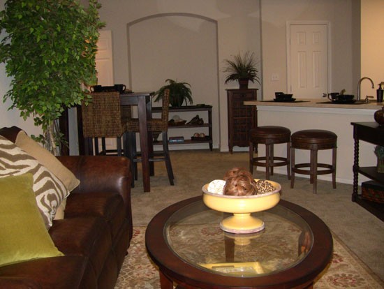 SpringRidge model of living room looking into dining room and kitchen area