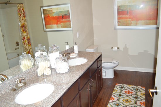 Boulders on Fern Apartments big model master bathroom with 2 sinks and large mirror