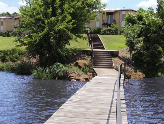 Villa Del Lago view from boathouse looking up at apartment complex