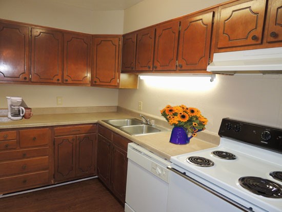 Villa Del Lago Apartments beautiful model kitchen with lots of storage space and counter top