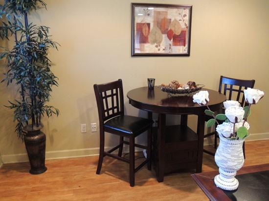 Woodland Terrance Apartment interior of office building with tables and chairs to sit office